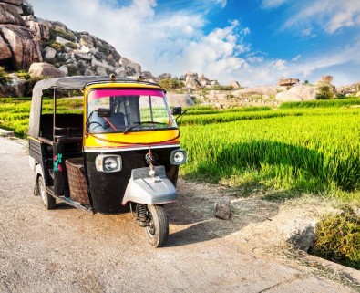 tuk tuk rickshaw in paddyfield